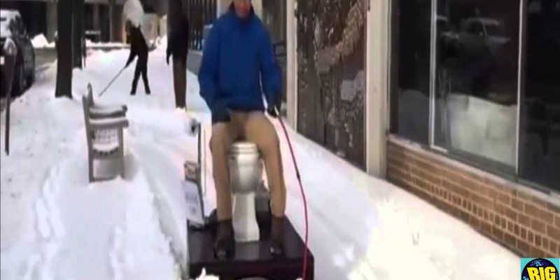 Man Plows Snow on Motorized Toilet